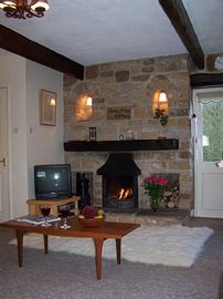 Open fire at Locka Old Hall Cottage