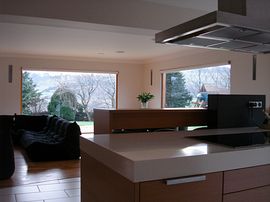 Part of kitchen, seating area.