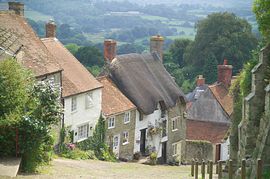 Updown Cottage with Curtain Billowing