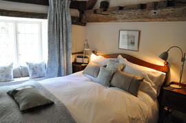 Aqua Bedroom with Window Seat Overlooking Gold Hill