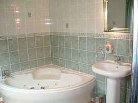 Bathroom with whirlpool bath
