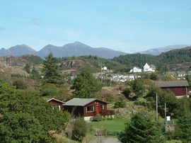 Chalets with Quinaig in the background