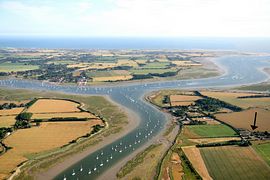 Canute Cottages from the air, indicated by the arrow