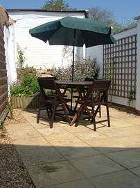 picture of enlosed garden with furniture