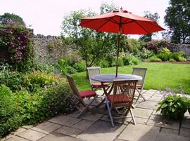 Secluded patio in walled garden