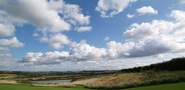 View over the fishing lake from the Granary