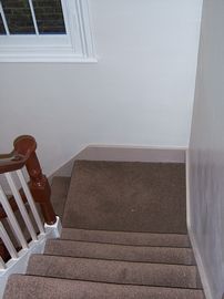 stairs up to bathroom and bedrooms