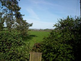 the field abuts the garden