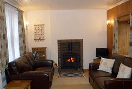 sitting room with log fire