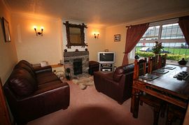 Comfortable Living Room With Open Fire