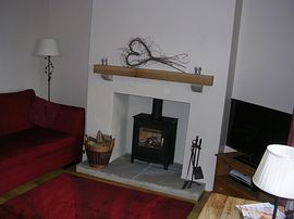 Sitting room with wood burning stove