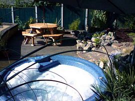 Hot tub and seating on the decked area