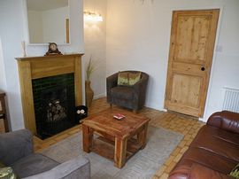 Cosy living room with open fire