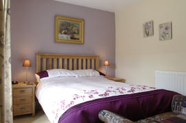 Pretty double bedroom at Clipstone Cottage in Masham.