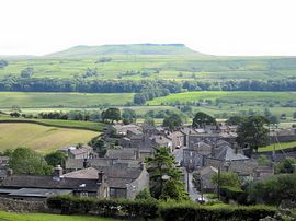Looking over the rooftops of Askrigg towards Addleborough.