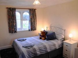 One of 3 cosy bedrooms