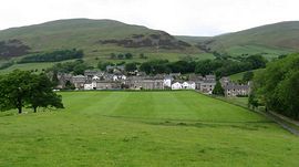 Cottage nestling at foot of Howgills