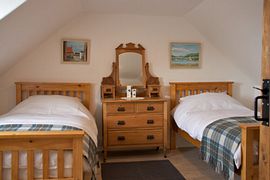 One of the twin bedrooms