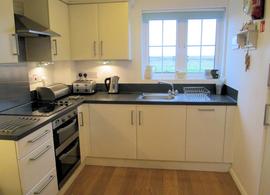 Kitchen area of open plan living room/kitchen