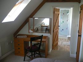 Bedroom looking into ensuite shower oom