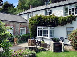 Driftwood Cottage in the south facing courtyard.