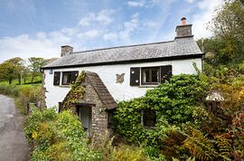 Crooked Lake Cottage from the lane.